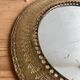 Round hammered brass mirror / vintage openwork