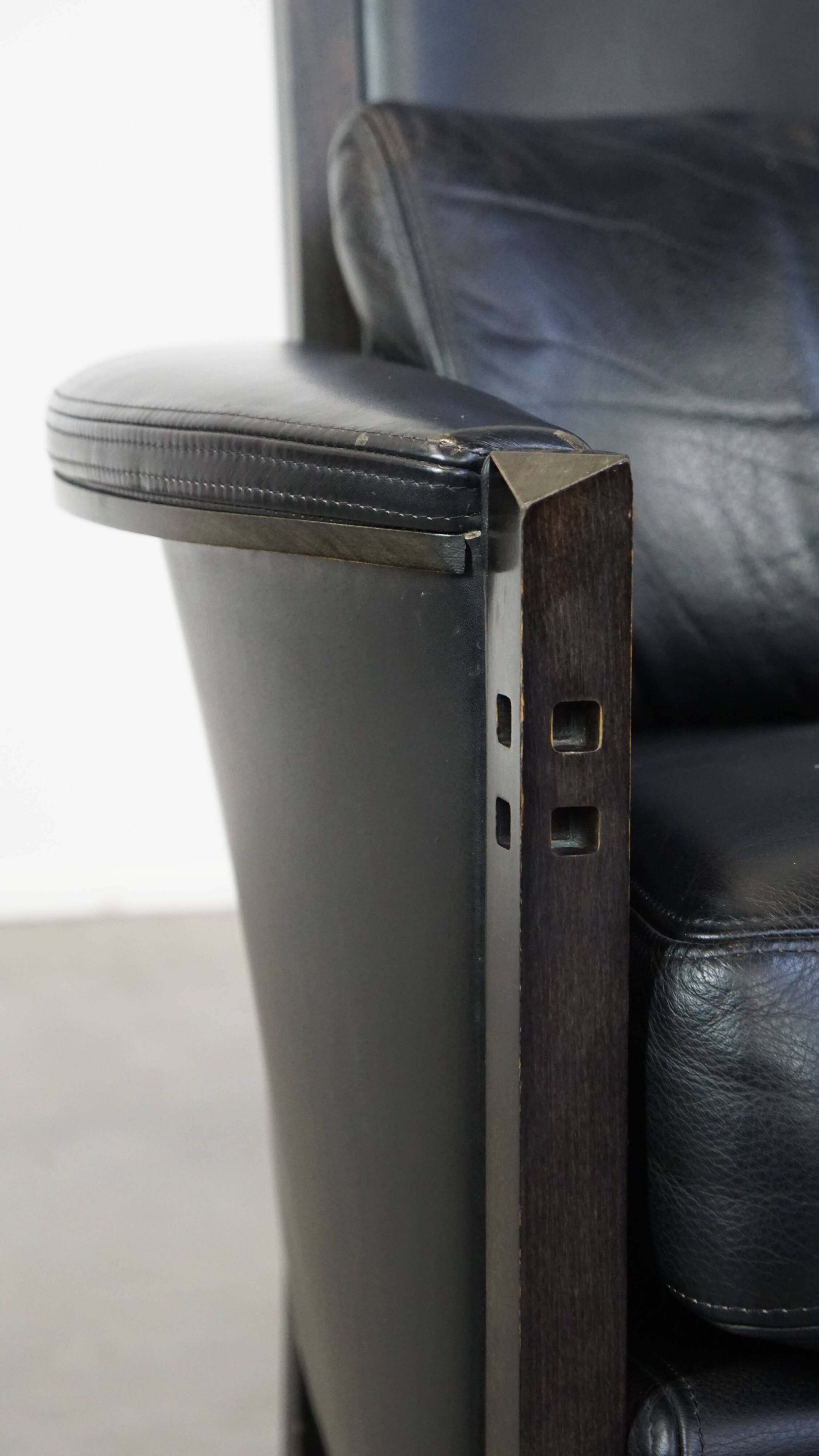 Fauteuil design en cuir noir de Giorgetti