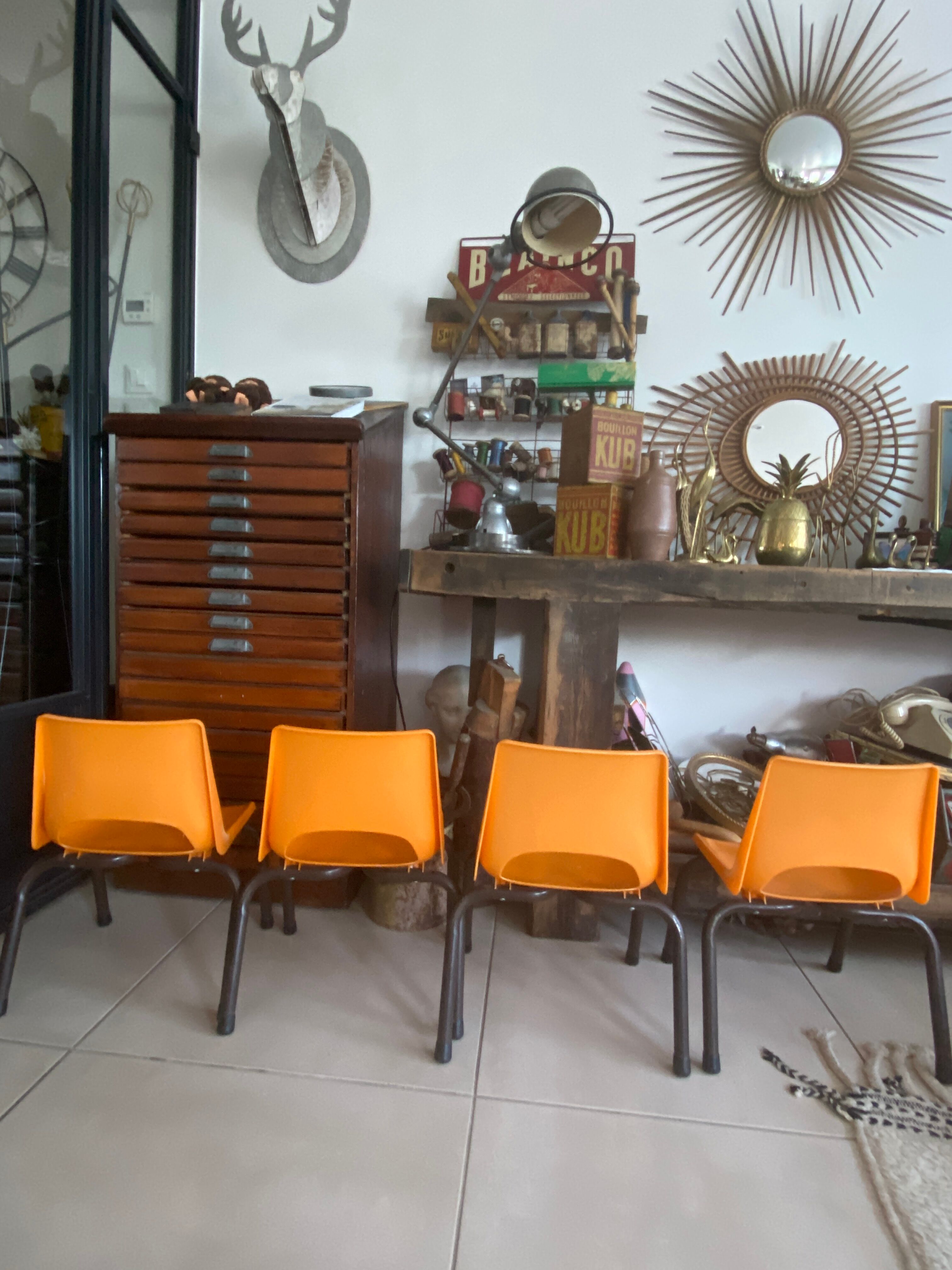Set of 4 orange school chairs