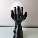 Italian design ceramic table lamp, two hands and glass shade.