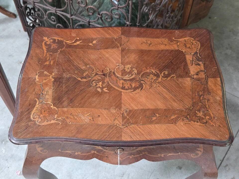 work table from the Napoleonic III era with marquetry of scrolls and patterns