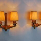 Pair of two-armed art deco "ball" wall lights, carved wood, France, 1960