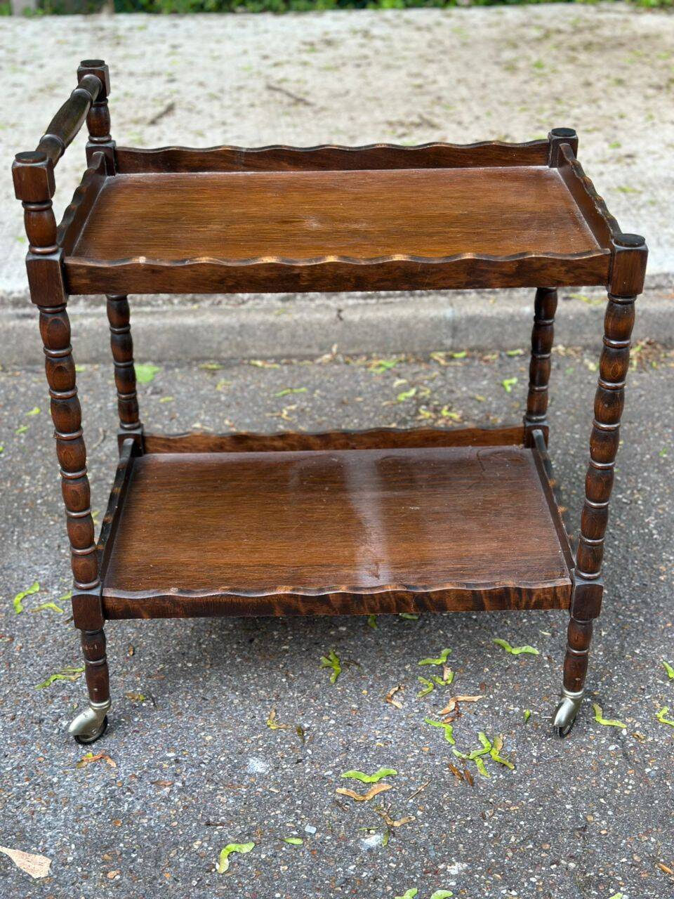 Vintage rolling bar side table in chic rustic style from the 1950s.