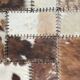 Patchwork carpet in cowhide 164x105cm from the 70s