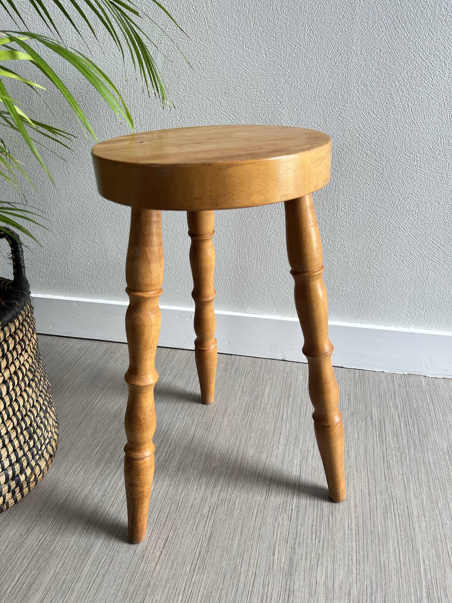 Wooden tripod stool