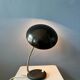 Small black metal desk lamp in Bauhaus style.