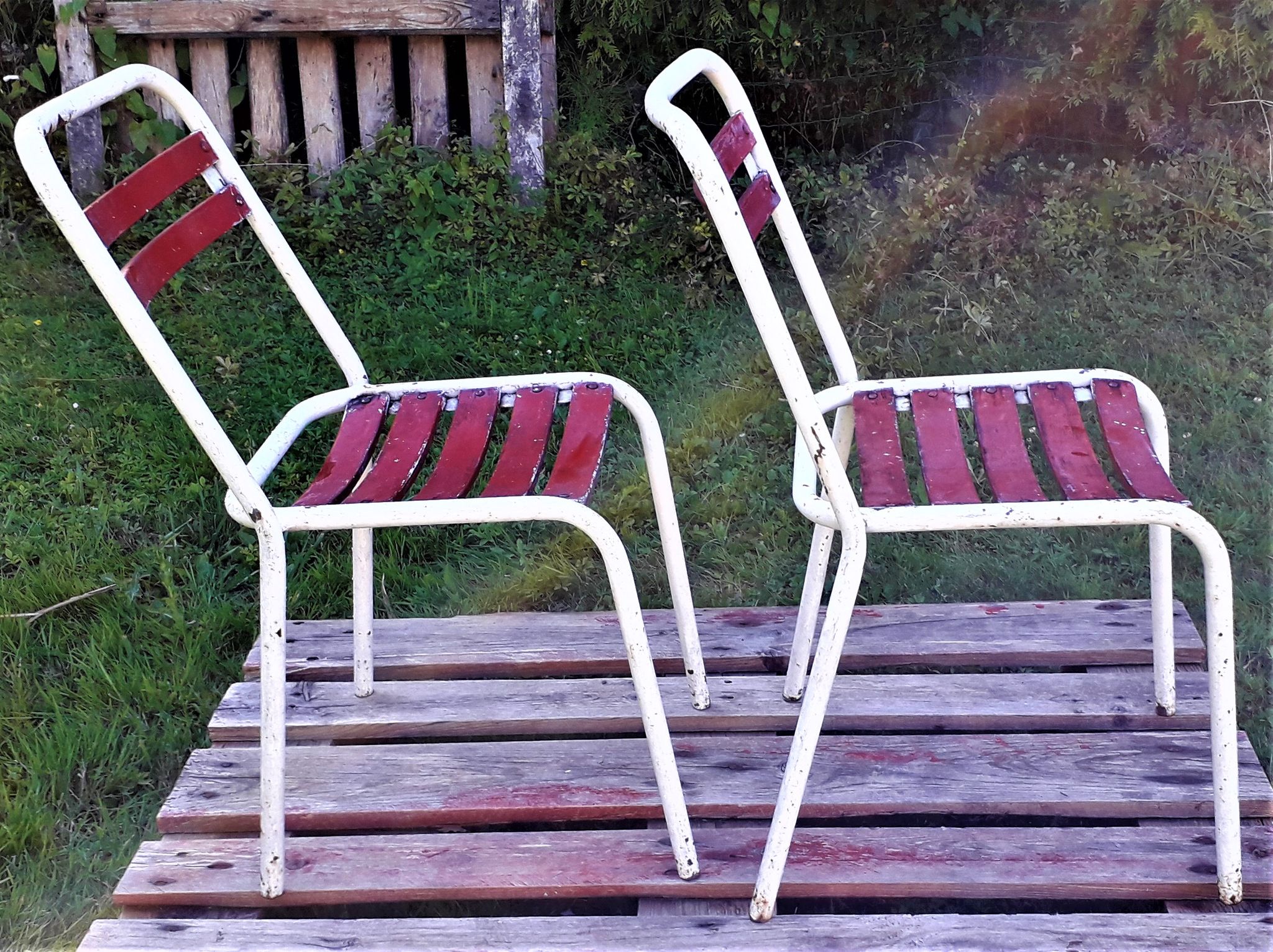 Duo of chairs Tolix sitting wood