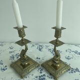 Pair of brass dolphin candlesticks, late 19th century, Napoleonic period