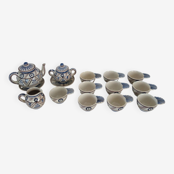 Old ceramic tea service with hand decor