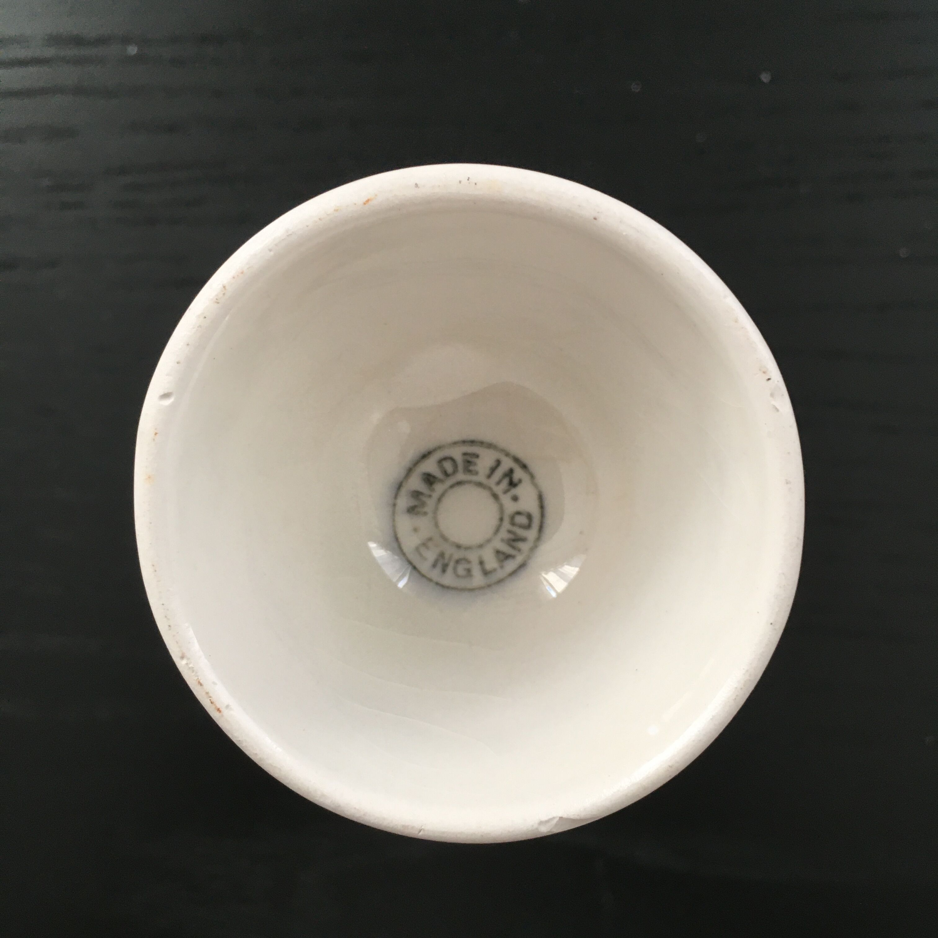 White vase with wheat decoration.