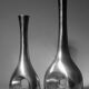 Ensemble de vases hauts en aluminium poli avec découpes circulaires