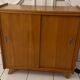Vintage shoe cabinet with compass legs