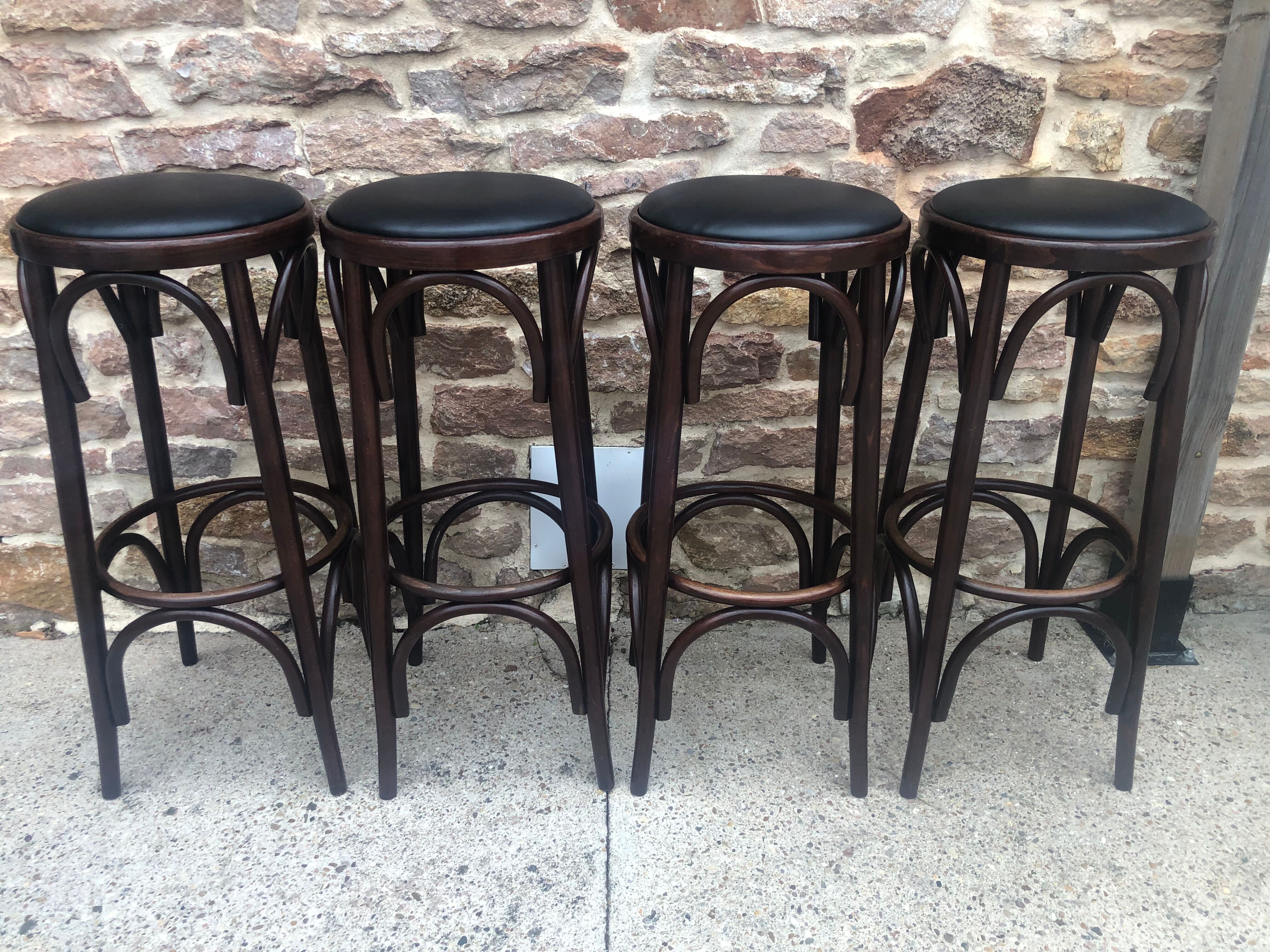 Suite of 4 bar stools