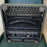 Triumph perfekt typewriter with its transport box.
