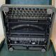 Triumph perfekt typewriter with its transport box.