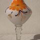 Vase en verre fleuri fleur orange sur pied