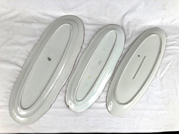Series of three fish dishes, Lunéville earthenware and Limoges porcelain
