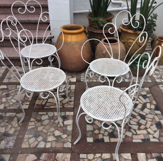 2 armchairs & 2 chairs, wrought iron1950