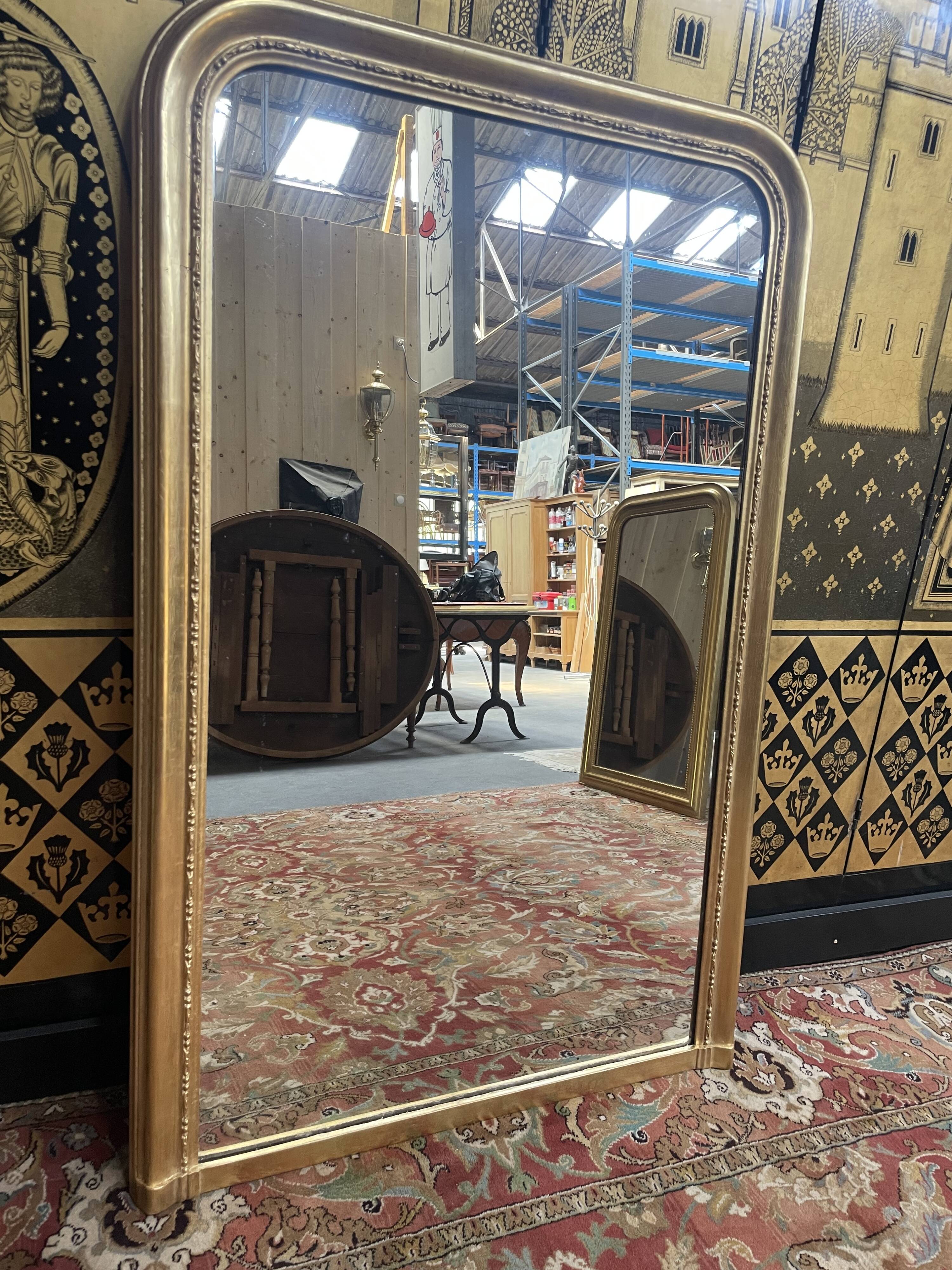 Louis Philippe era mirror with restored gold leaf