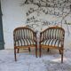 Pair of "swan neck" armchairs