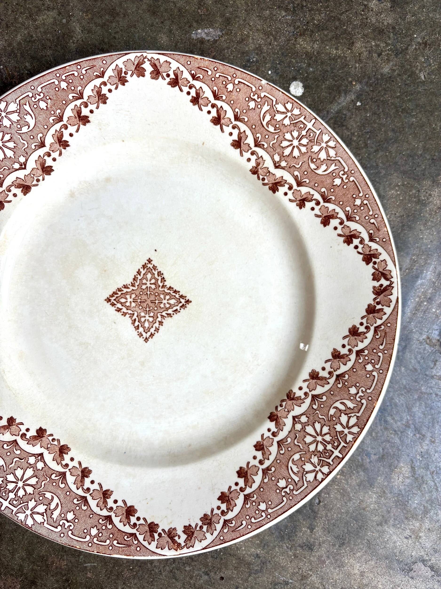 Longwy round dish in brown ironstone, "Andalous" service