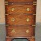 Pair of vintage military campaign high chests of drawers with leather tops.