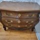 Curved commode in Louis XV / Regency style in solid oak.