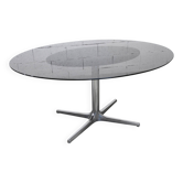 Table ovale Roche Bobois 1970 verre fumé pieds chromes 152x117 cm