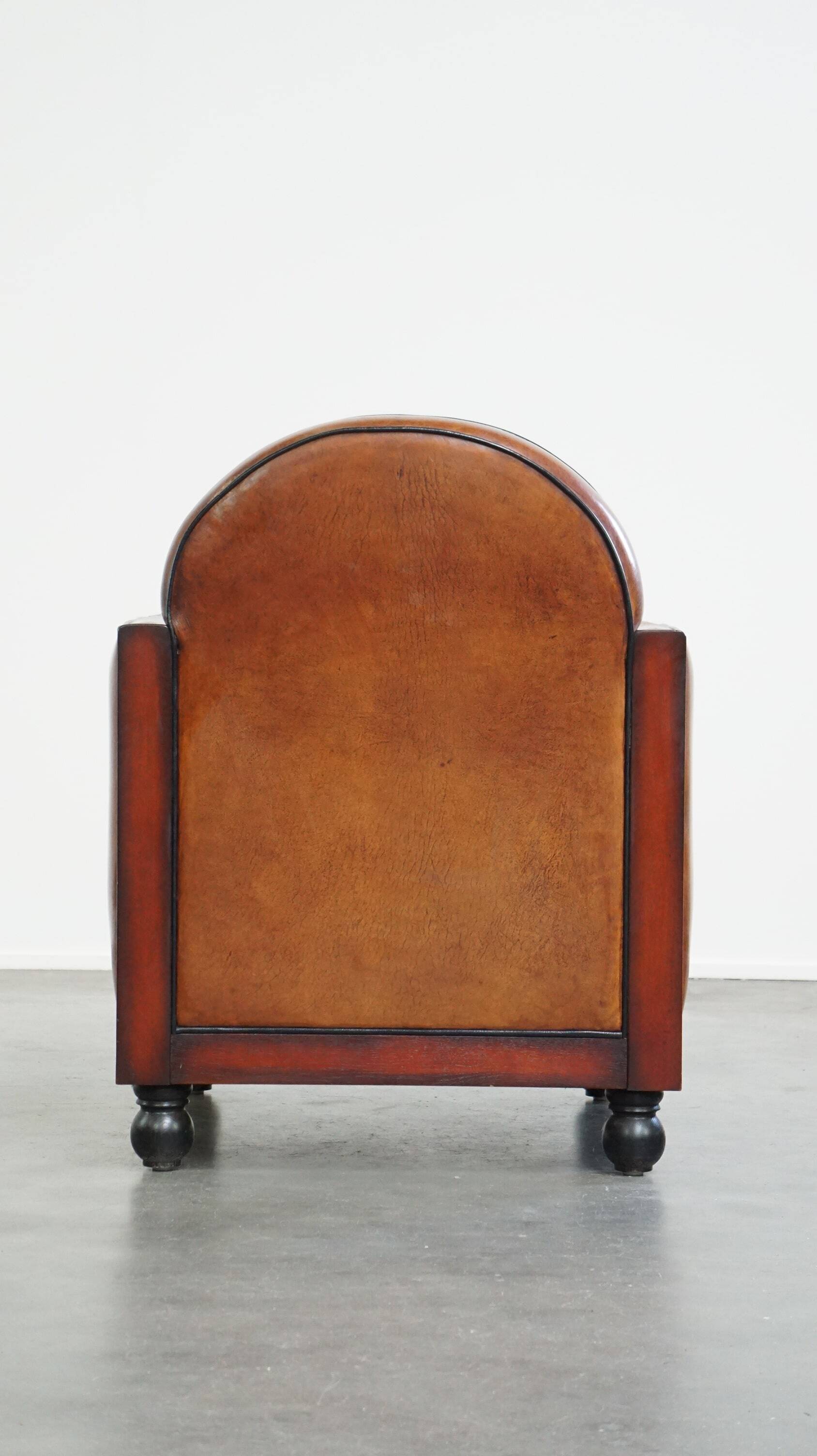 Cognac-colored sheepskin Art Deco design armchair in good condition