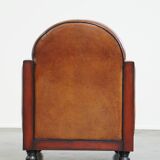 Cognac-colored sheepskin Art Deco design armchair in good condition