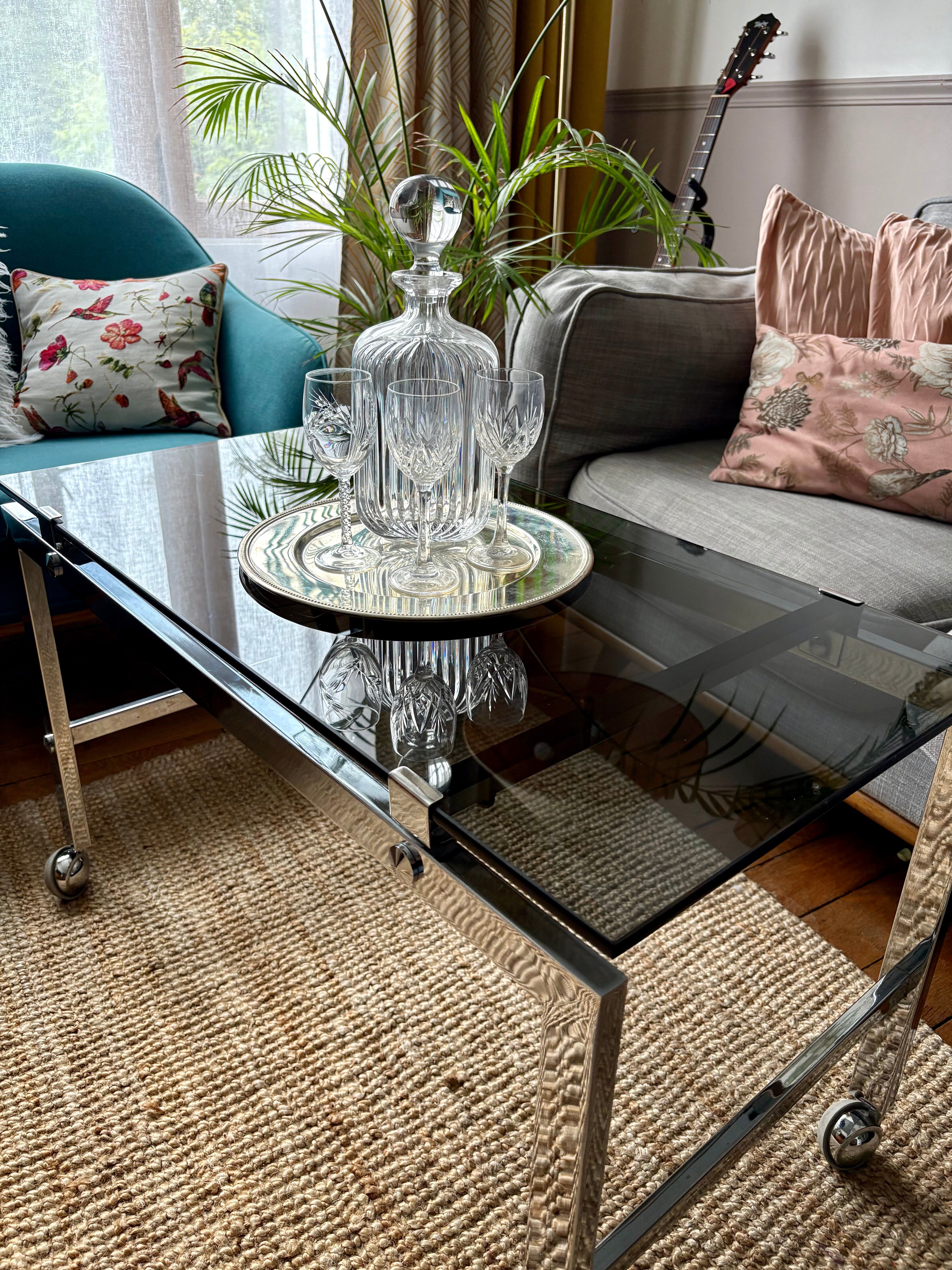 Chrome and smoked glass coffee table on wheels 1970