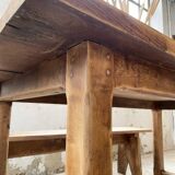 Oak farmhouse table and its two benches