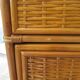 Storage column, wooden bookshelf and woven rattan.