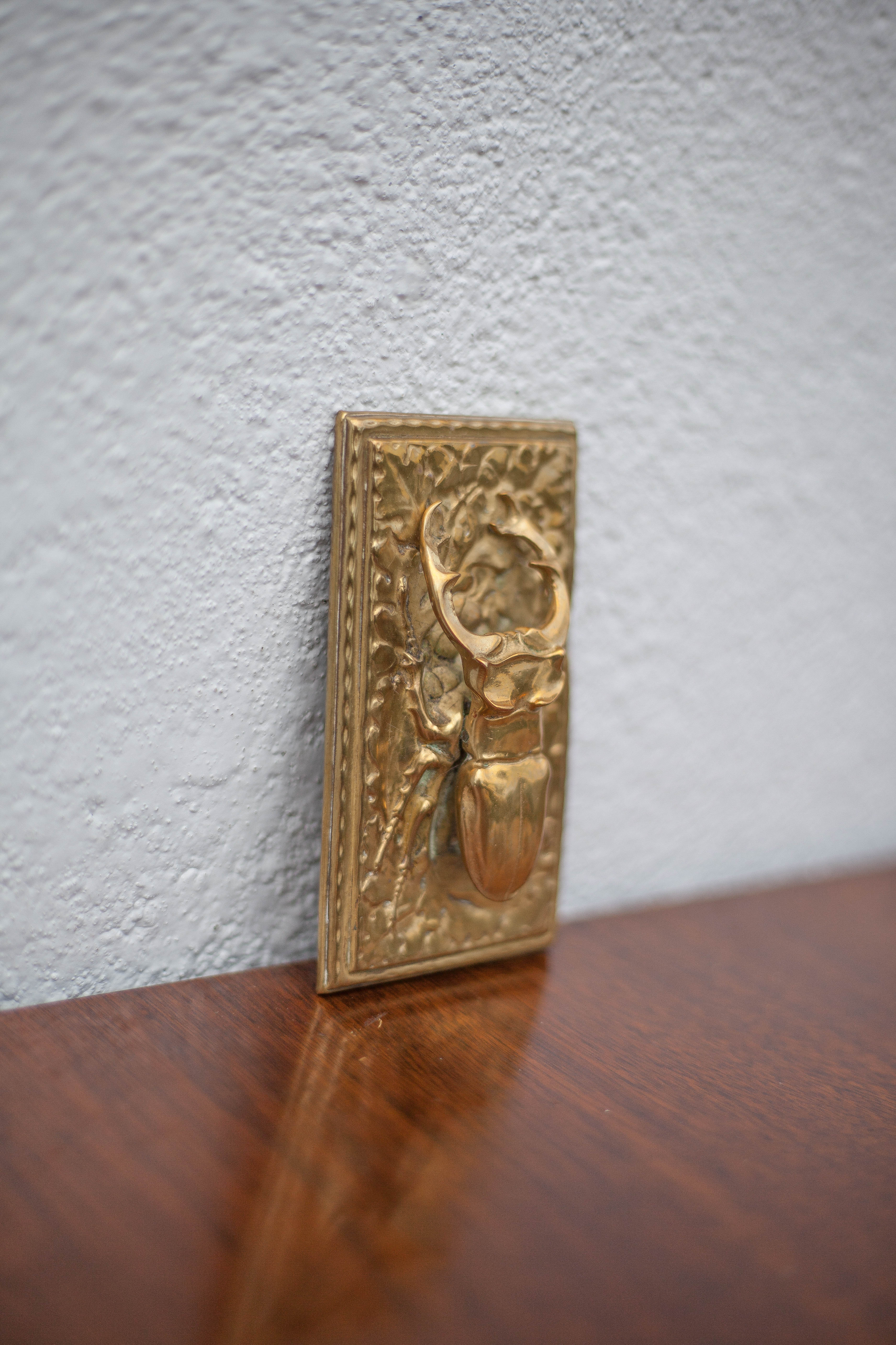 Scarab brass mail clip