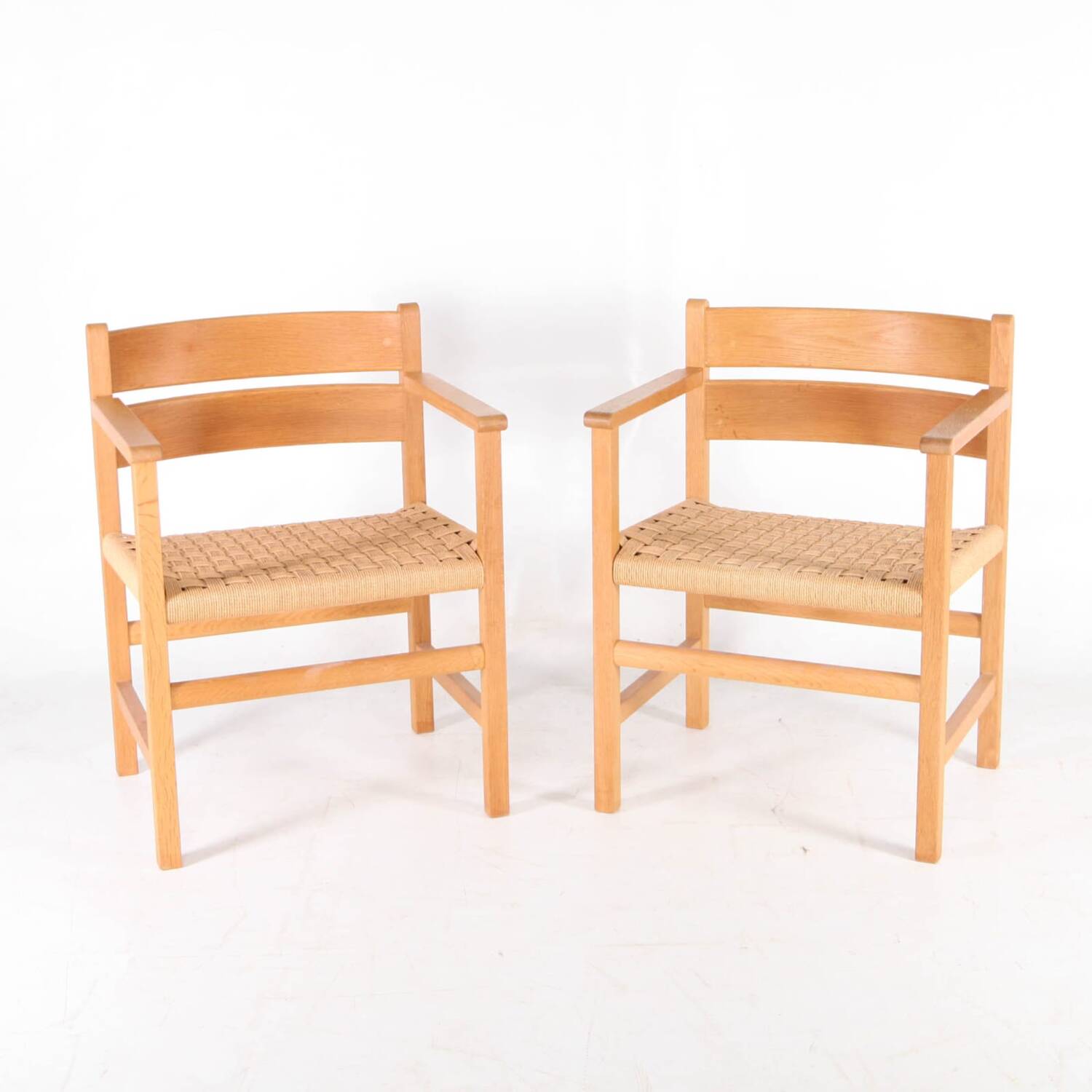 Pair of wooden and rope armchairs