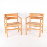 Pair of wooden and rope armchairs