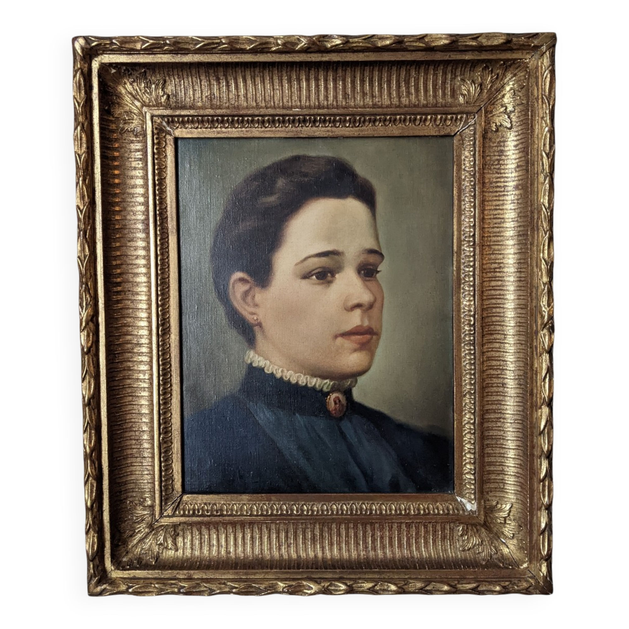 Oil on canvas portrait in an antique gilded wooden frame.