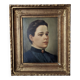Oil on canvas portrait in an antique gilded wooden frame.