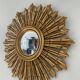 Old witch's eye mirror in gilded wood 62cm