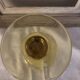 Yellow chalice vase, yellow glass vase on a pedestal.