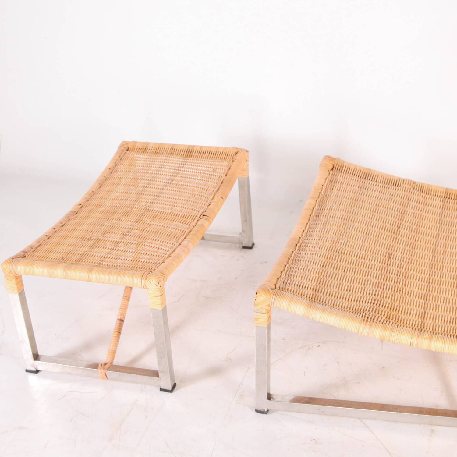Pair of metal and rattan armchairs