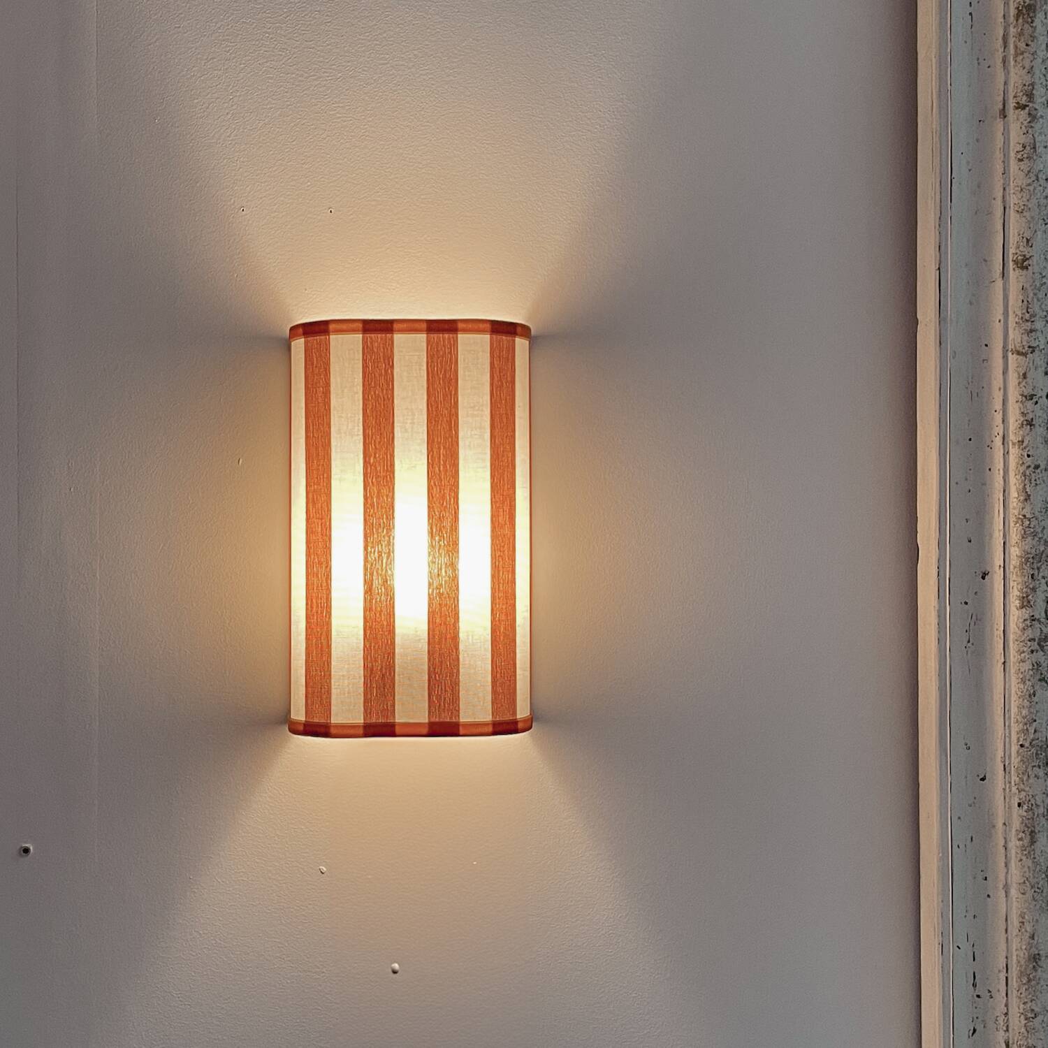 Pair of terracotta striped fabric wall sconces