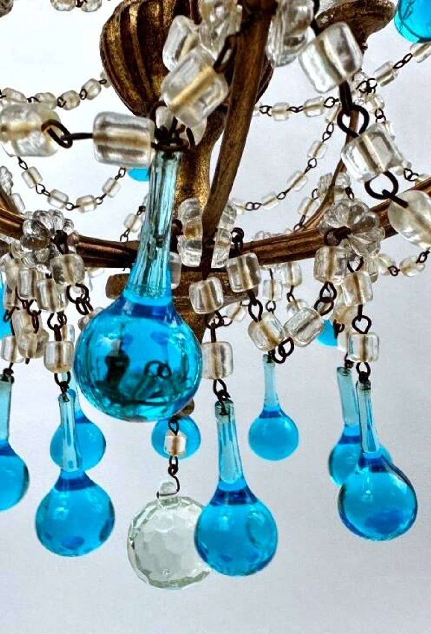 Italian chandelier with blue beads and gilded wood