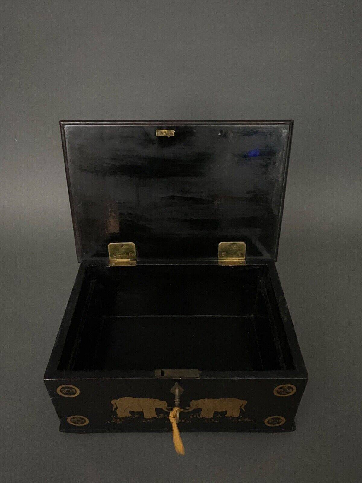20th century Indian wooden box black lacquer decorated with animals with gold highlights