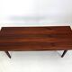 Beautiful compact design coffee table made of rosewood from the 1960s.