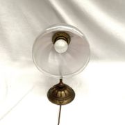 Brass wall light with a glass globe dimension: height -21cm- width -27cm-