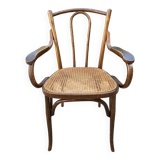 Baumann curved caned wood armchair, 1900