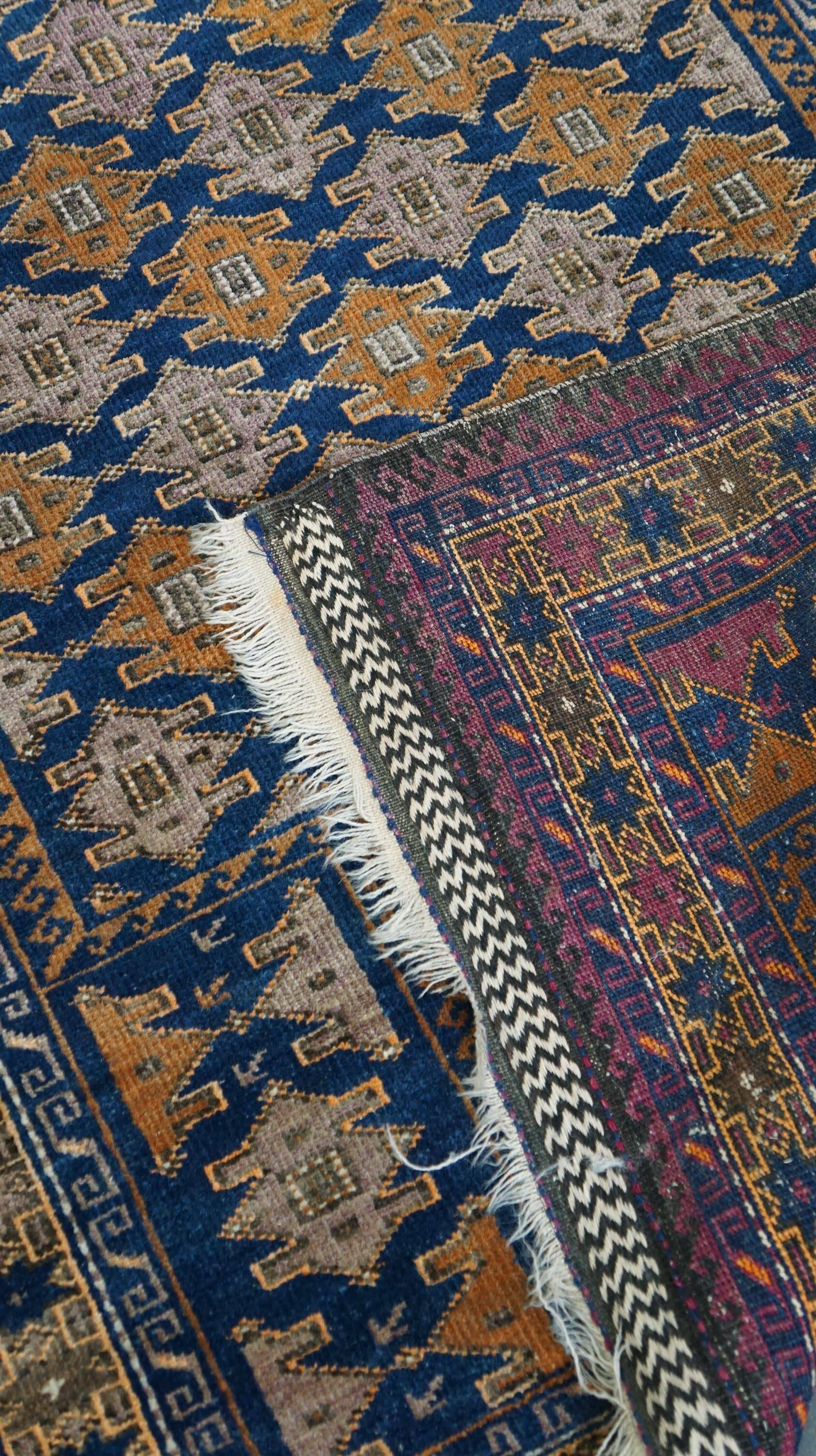 Orange and blue Persian rug 132×83 cm