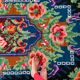 Rug with floral design on a blue background made by hand in Romania