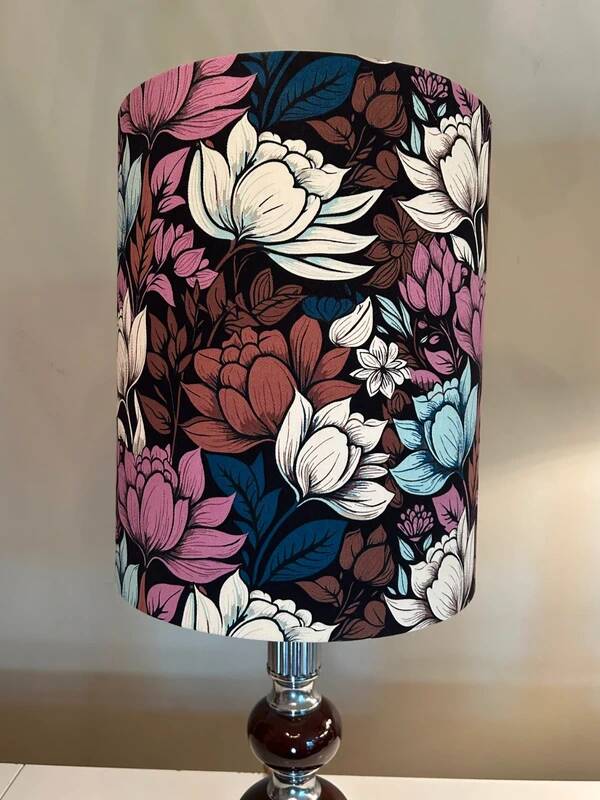 Lampshade like new with an eye-catching floral pattern.